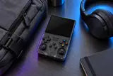 Console beside a backpack